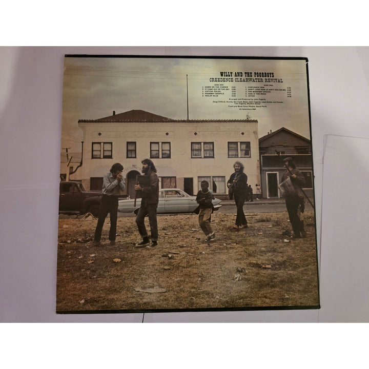 CCR Creedence Clearwater Revival "Willy and The Poor Boys" LP signed with proof.