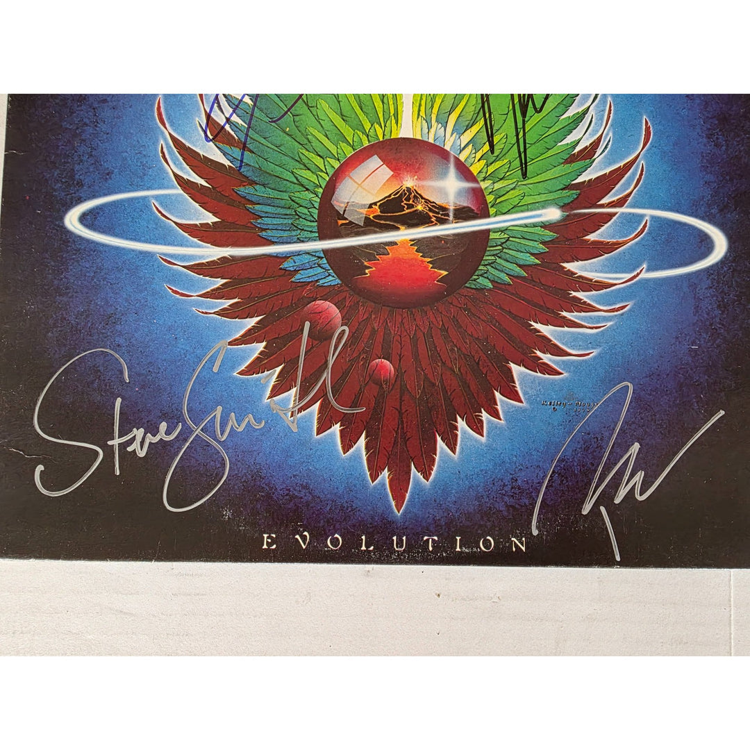Neal Schon, Ross Valory, Jonathan Cain, Greg Rowley Steve Perry Journey "Evolution" album signed with proof.