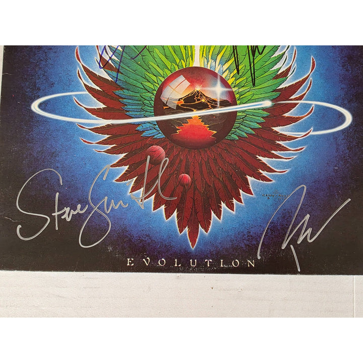 Neal Schon, Ross Valory, Jonathan Cain, Greg Rowley Steve Perry Journey "Evolution" album signed with proof.