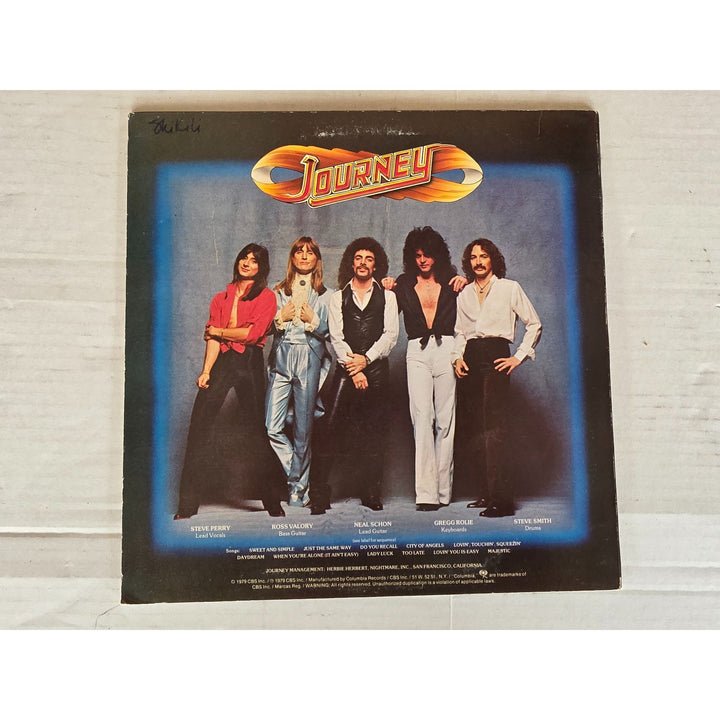 Neal Schon, Ross Valory, Jonathan Cain, Greg Rowley Steve Perry Journey "Evolution" album signed with proof.