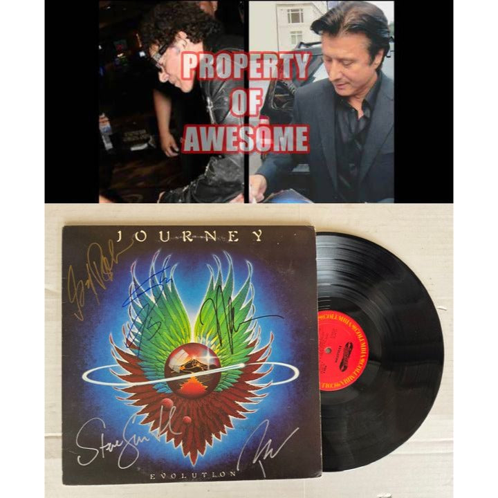Neal Schon, Ross Valory, Jonathan Cain, Greg Rowley Steve Perry Journey "Evolution" album signed with proof.