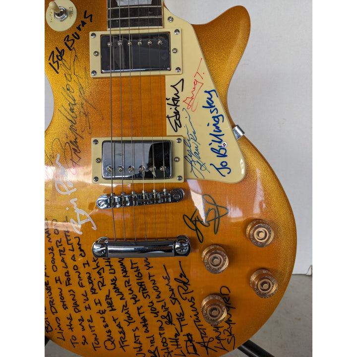 Lynrd Skynyrd black les paul electric guitar signed by 10 with lyrics incredible!