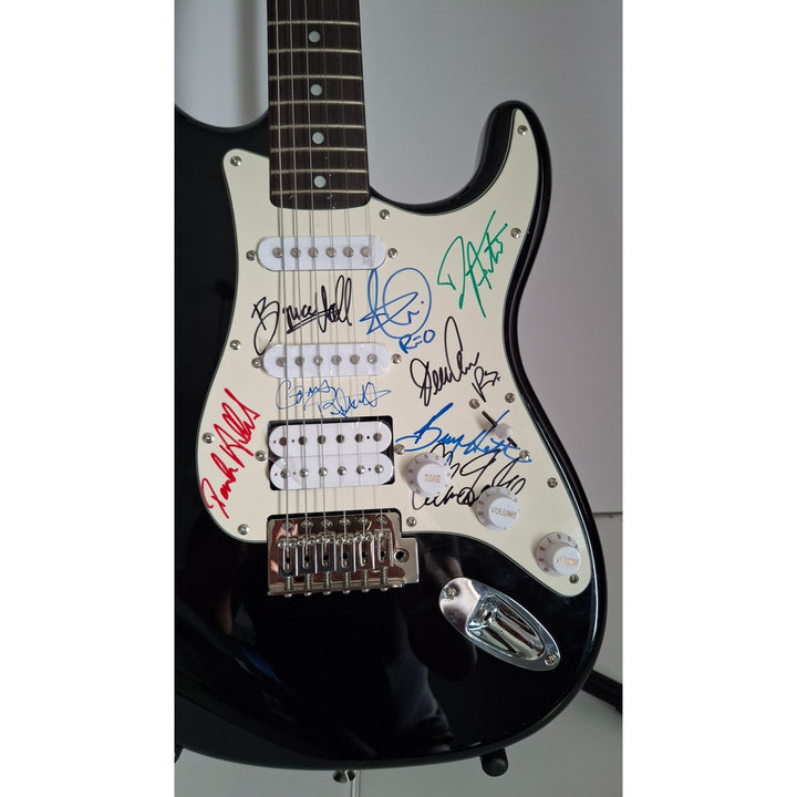 Bruce Hall, Dave Matto, Gary Richrath, Kevin Cronin, Neal Dought, REO Speedwago Fender Stratocaster Squier electric guitar signed with proof