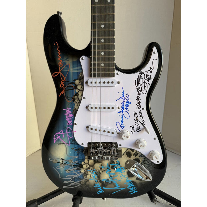 Black Sabbath Ronnie James Dio Ozzy Osbourne Tony Iommi Bill Ward Geezer Butler electric guitar signed with proof.