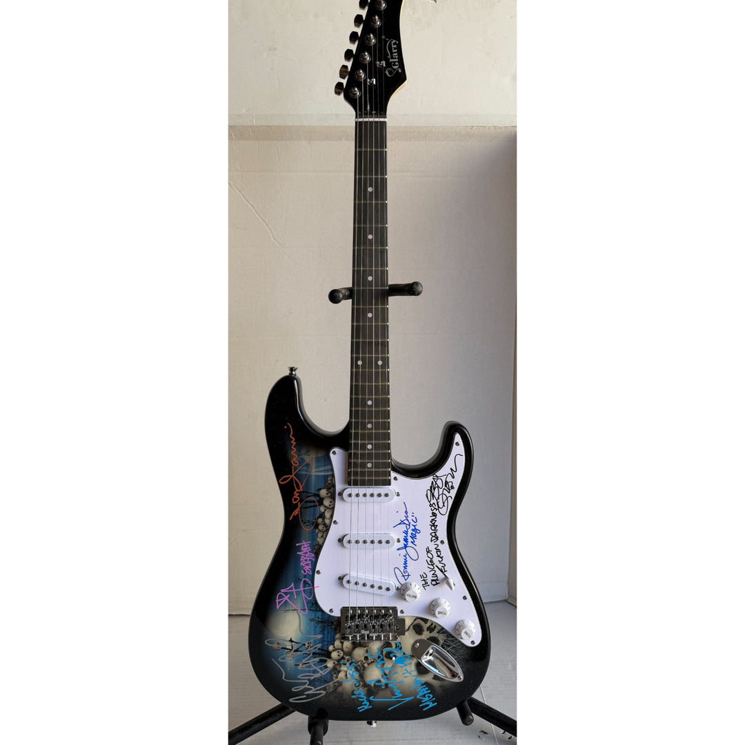 Black Sabbath Ronnie James Dio Ozzy Osbourne Tony Iommi Bill Ward Geezer Butler electric guitar signed with proof.