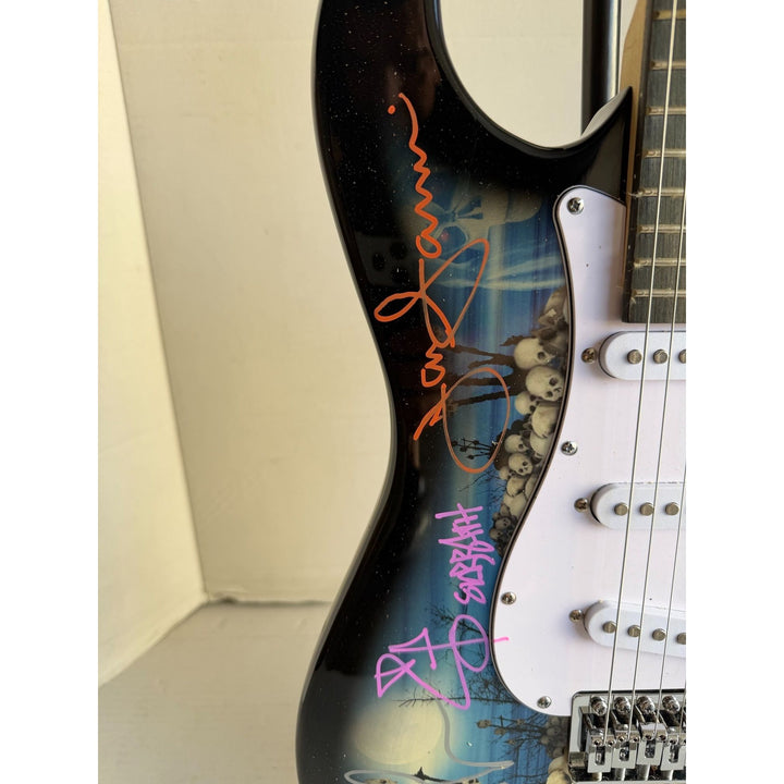 Black Sabbath Ronnie James Dio Ozzy Osbourne Tony Iommi Bill Ward Geezer Butler electric guitar signed with proof.