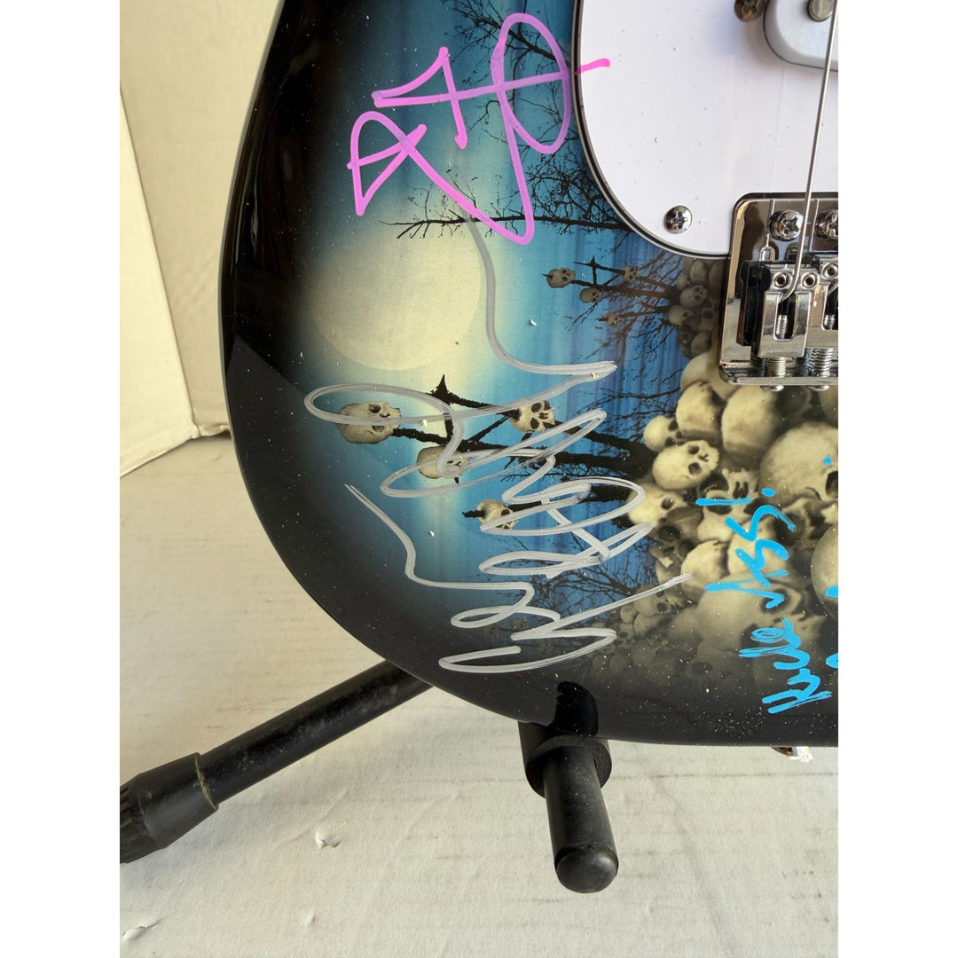 Black Sabbath Ronnie James Dio Ozzy Osbourne Tony Iommi Bill Ward Geezer Butler electric guitar signed with proof.