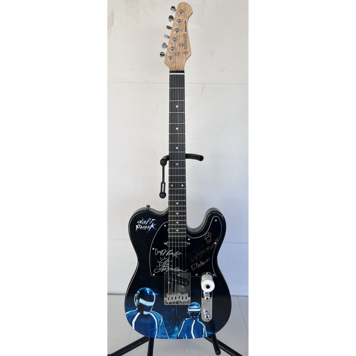 Daft Punk (Thomas Bangalter & Guy Manuel de Homem-Christo) signed with sketch on "One of a Kind" telecaster full size electric guitar.
