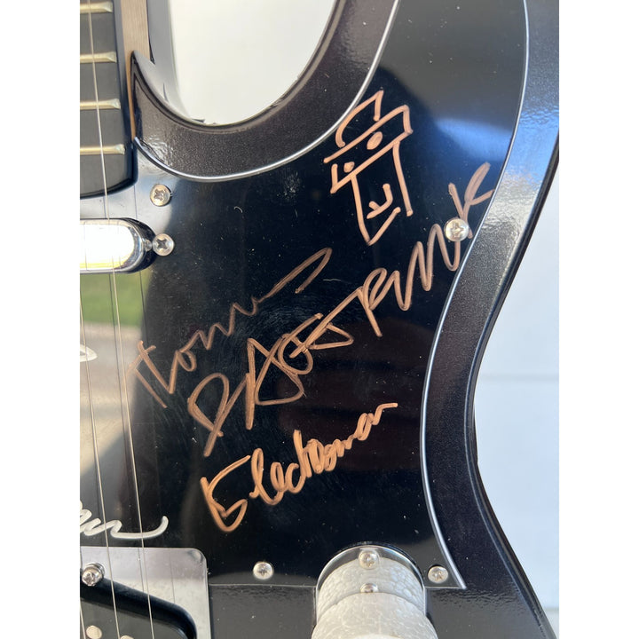 Daft Punk (Thomas Bangalter & Guy Manuel de Homem-Christo) signed with sketch on "One of a Kind" telecaster full size electric guitar.