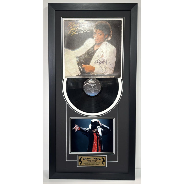 Michael Jackson "Thriller" lp signed with proof and museum quality frame with plexi 18x34 2995