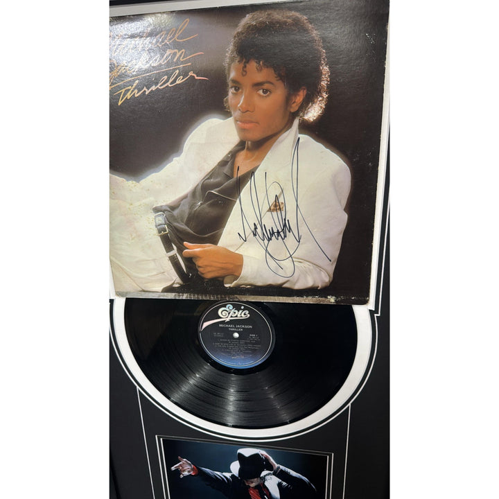 Michael Jackson "Thriller" lp signed with proof and museum quality frame with plexi 18x34 2995
