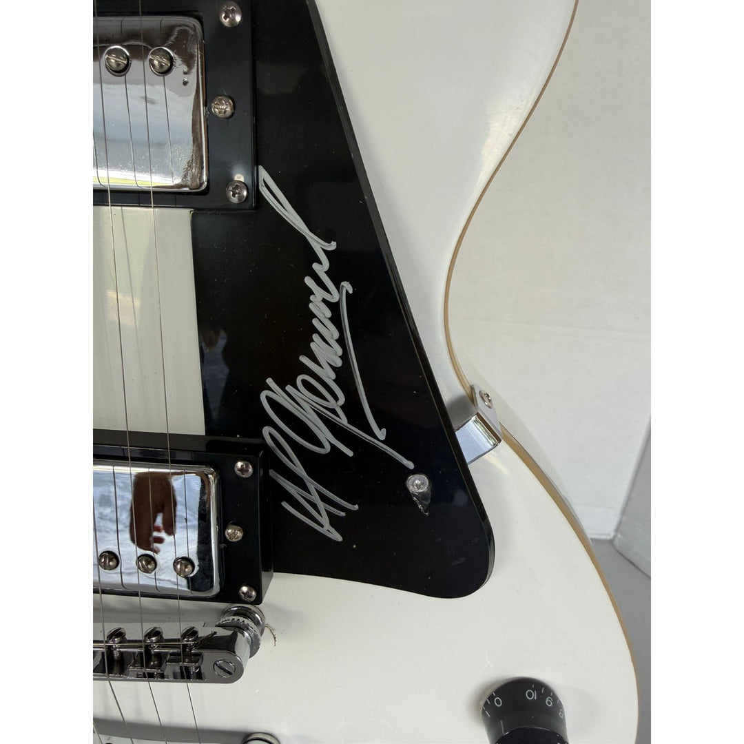 Foreigner les paul electric guitar signed by Mick Jones, Dennis Elliott, Al Greenwood, Lou Gramm, Ian McDonald and Ed Gagliardi.