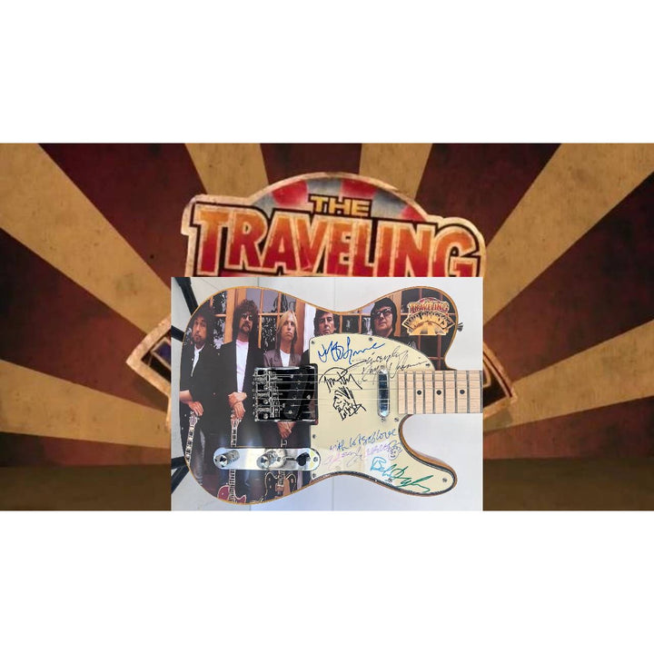 Traveling  Wilburys Roy Orbison Jeff Lynne Bob Dylan Tom Petty George Harrison full size electric guitar signed  with proof.