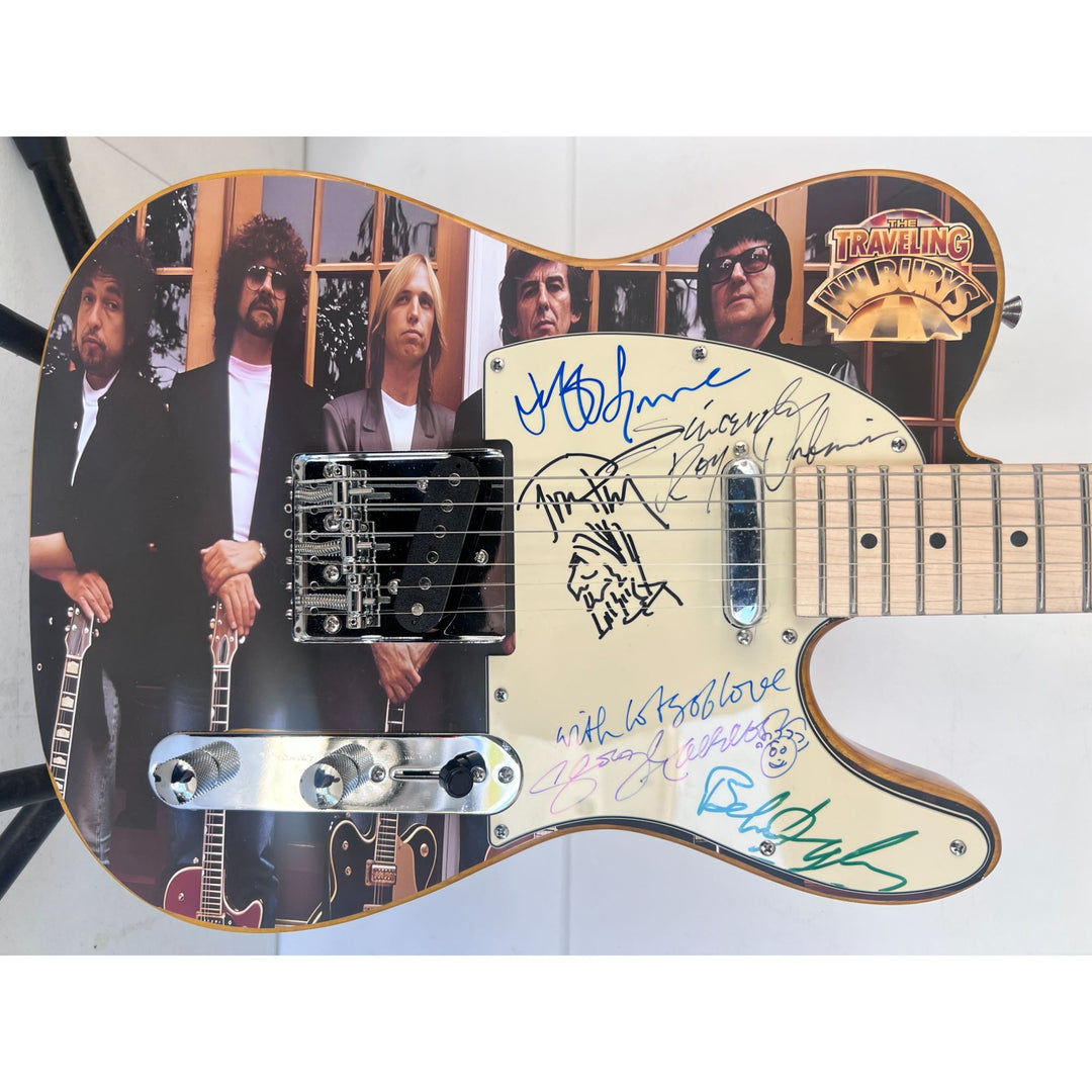 Traveling  Wilburys Roy Orbison Jeff Lynne Bob Dylan Tom Petty George Harrison full size electric guitar signed  with proof.
