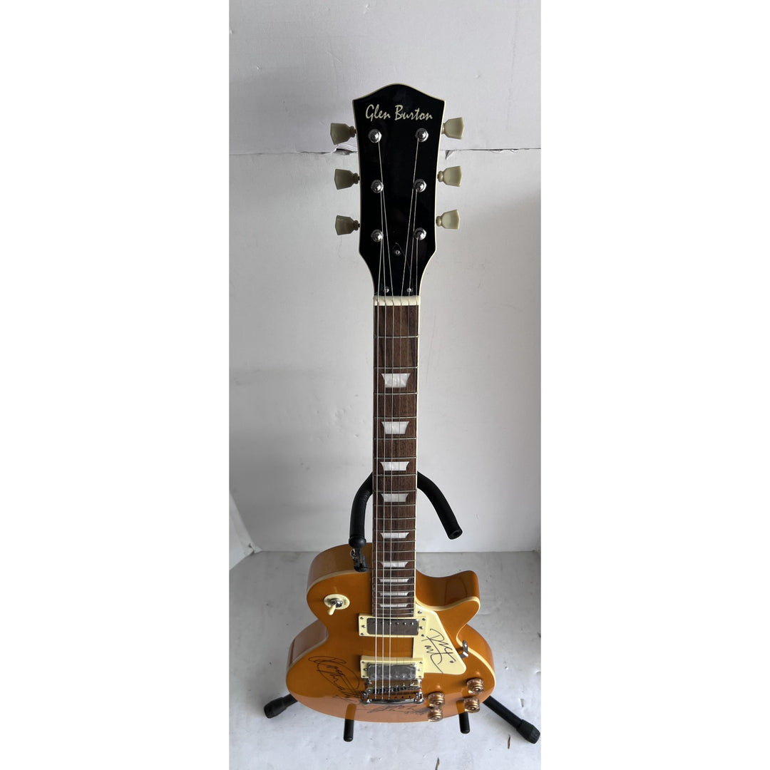 Pete Townshend Roger Daltrey John Entwistle "The Who" gold Les Paul electric guitar signed with proof