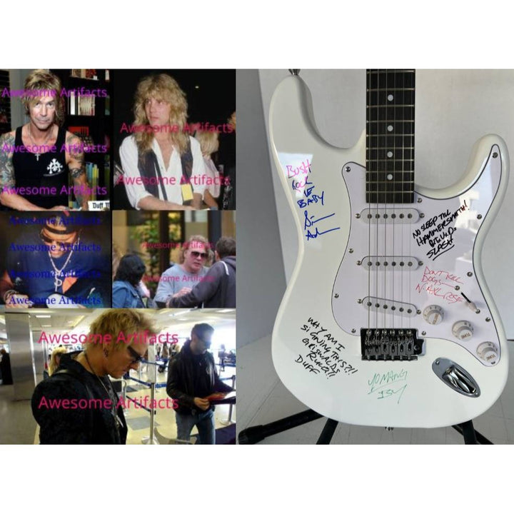 Vintage Guns N Roses signed electric guitar with inscriptions Axl Rose, Slash, Duff McKagan, Steven Adler,  Izzy Stradlin, signed with proof
