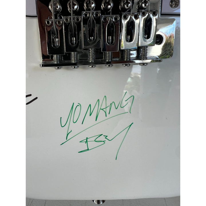 Vintage Guns N Roses signed electric guitar with inscriptions Axl Rose, Slash, Duff McKagan, Steven Adler,  Izzy Stradlin, signed with proof