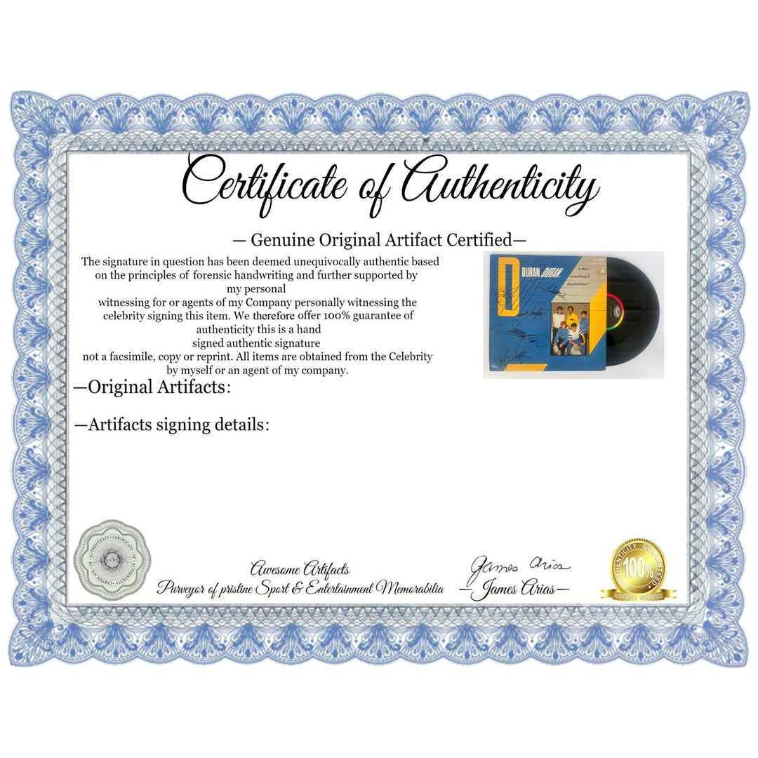 Duran Duran 'Is there something I should know" signed LP with proof