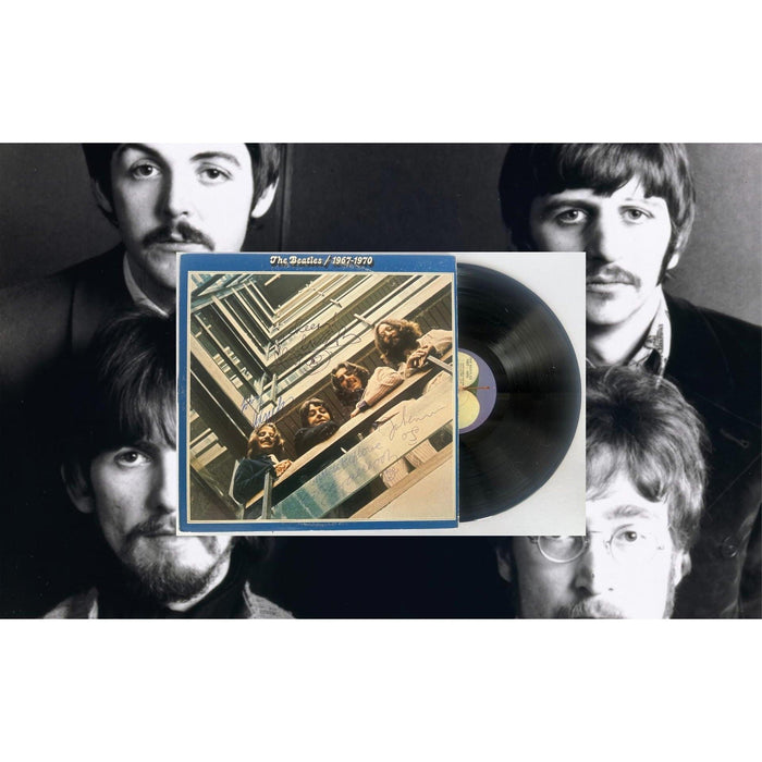The Beatles "1967-70" original lp signed by John Lennon George Harrison Paul McCartney, and Ringo Starr with proof