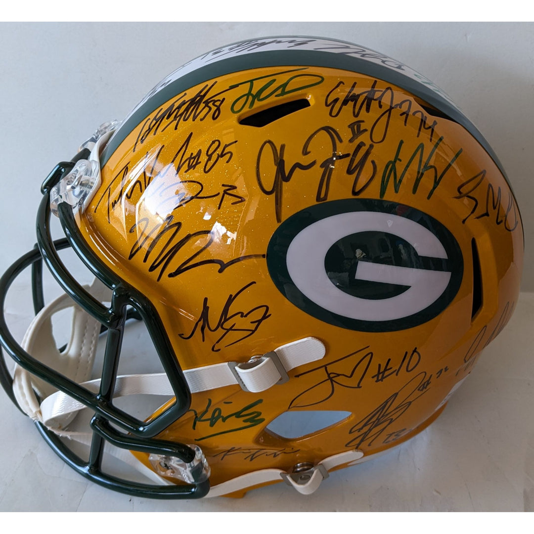 Green Bay Packers 2025 team helmet 35 plus Jordan Love Micah Parsons, Josh Jacobs, Romeo Doubs, Riddell full size helmet signed with proof
