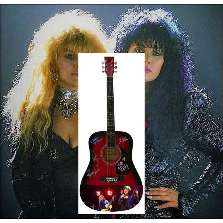 Ann and Nancy Wilson Heart One of a Kind full size acoustic guitar signed with proof.