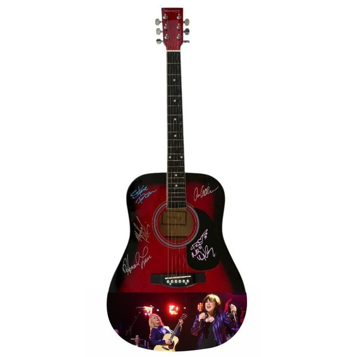 Ann and Nancy Wilson Heart One of a Kind full size acoustic guitar signed with proof.