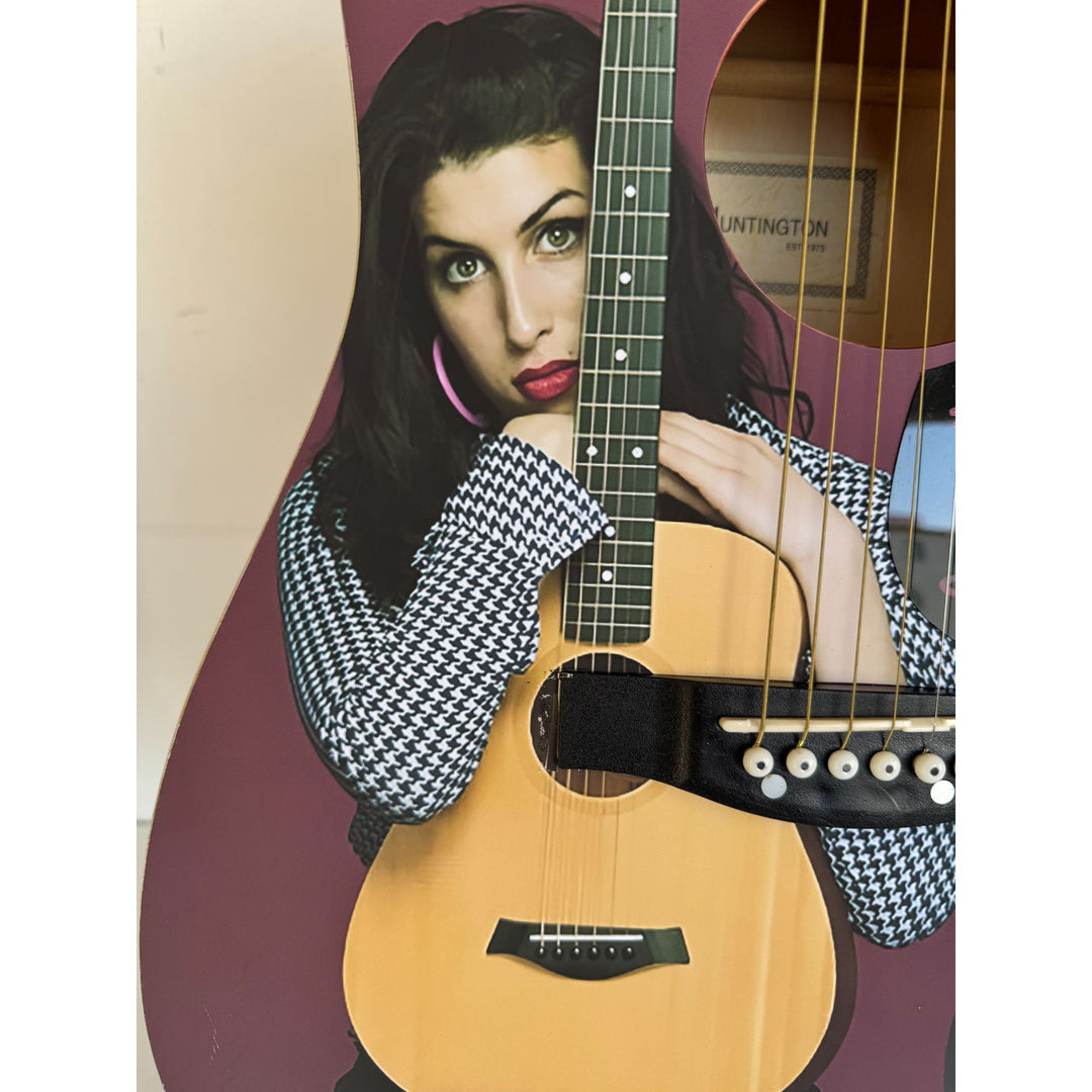 Amy Winehouse one of a kind full size acoustic guitar signed with proof.