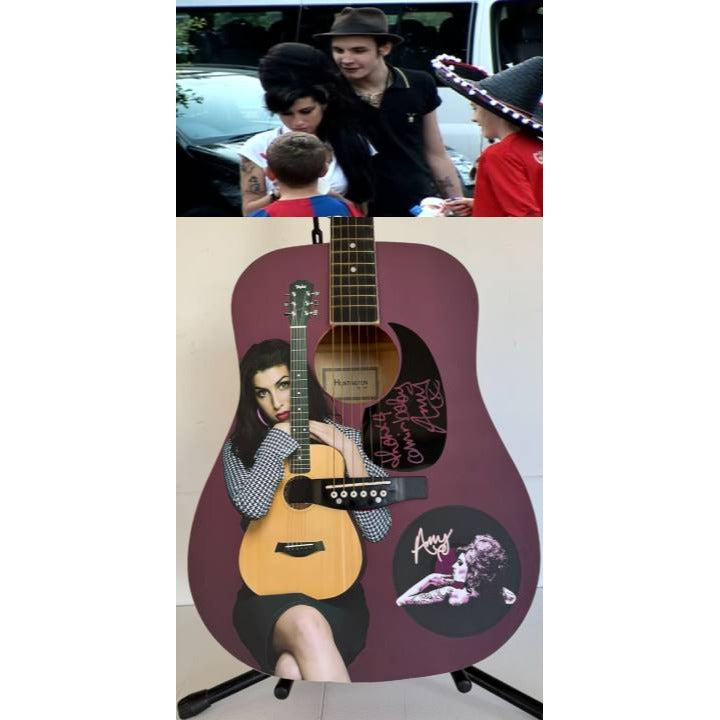 Amy Winehouse one of a kind full size acoustic guitar signed with proof.