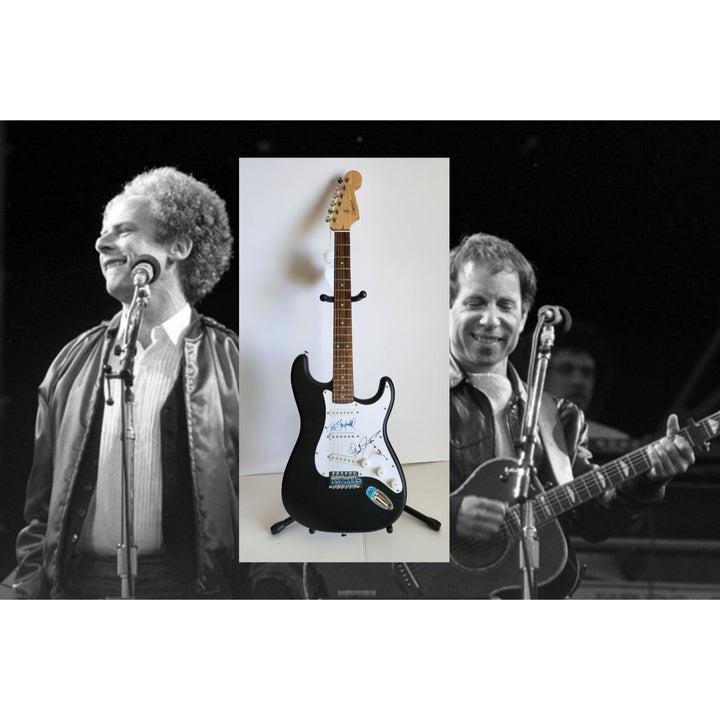 Garfunkel & Paul Simon, authentic Fender Stratocaster electric guitar signed with proof