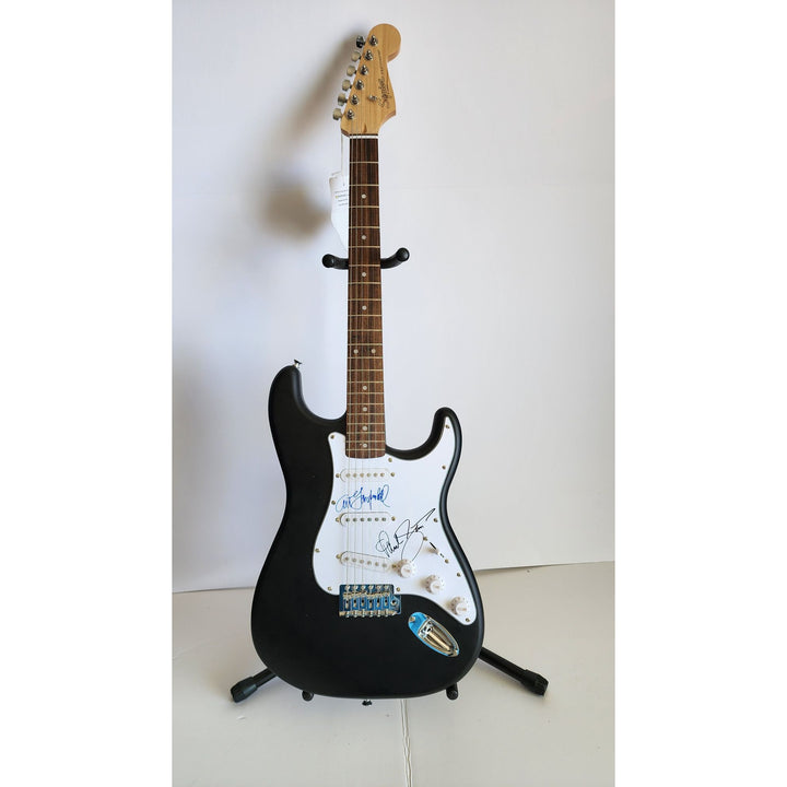 Garfunkel & Paul Simon, authentic Fender Stratocaster electric guitar signed with proof
