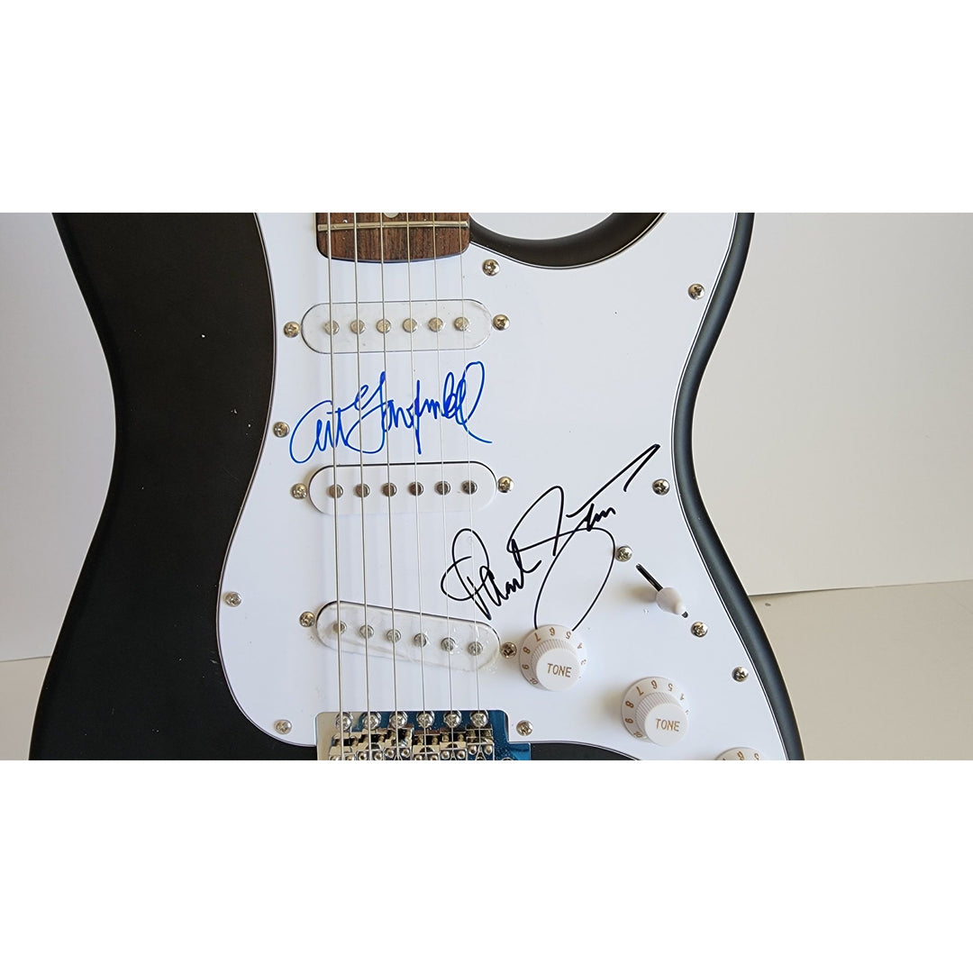 Garfunkel & Paul Simon, authentic Fender Stratocaster electric guitar signed with proof