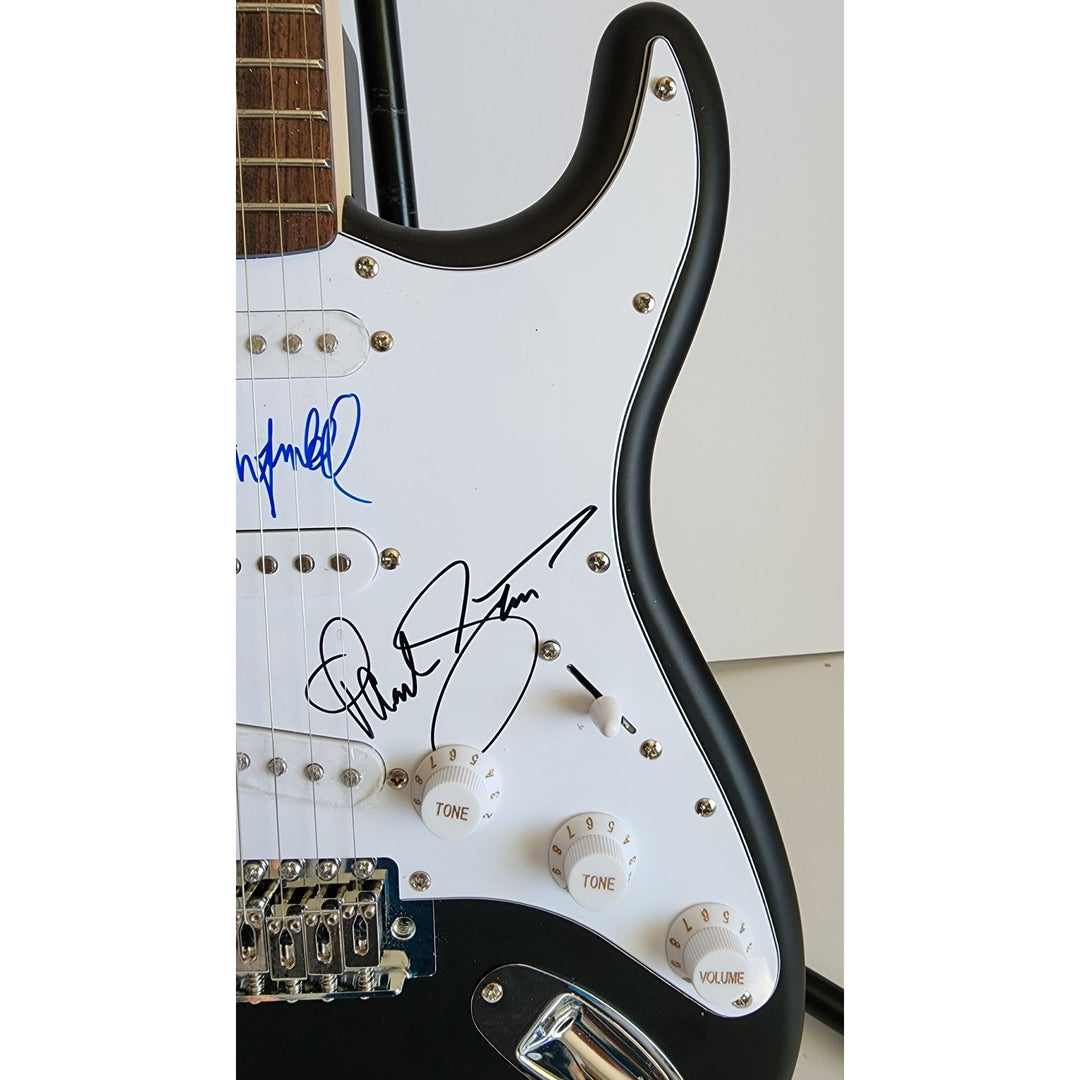 Garfunkel & Paul Simon, authentic Fender Stratocaster electric guitar signed with proof