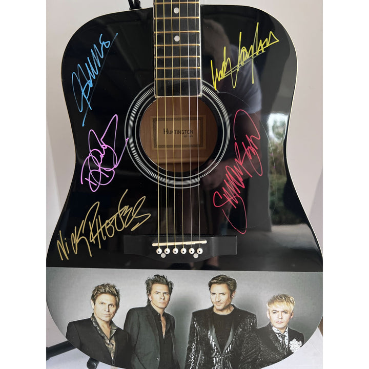 Duran Duran, Simon Le Bon, John, Roger & Andy Taylor, Nick Rhodes One of A kind 39' inch full size acoustic guitar signed with proof