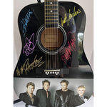 Load image into Gallery viewer, Duran Duran, Simon Le Bon, John, Roger &amp; Andy Taylor, Nick Rhodes One of A kind 39&#39; inch full size acoustic guitar signed with proof
