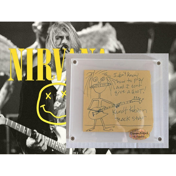 Black and white image with "Nirvana" text, yellow smiley face, and a doodle of a person with a guitar.
