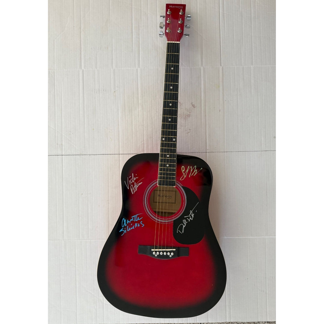 The Bangles Susanna Hoffs, Debbi Peterson, Vicki Peterson, and Michael Steele signed with proof.