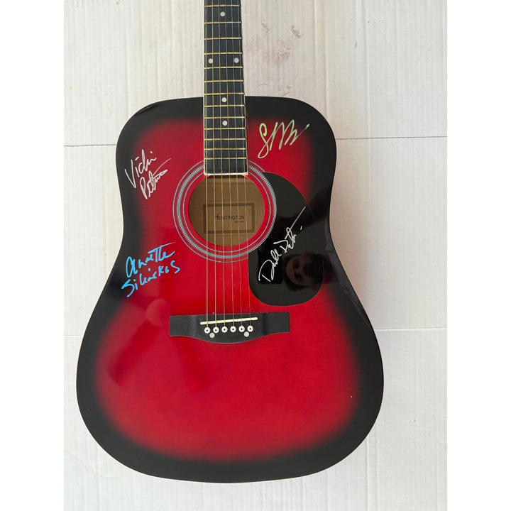 The Bangles Susanna Hoffs, Debbi Peterson, Vicki Peterson, and Michael Steele signed with proof.