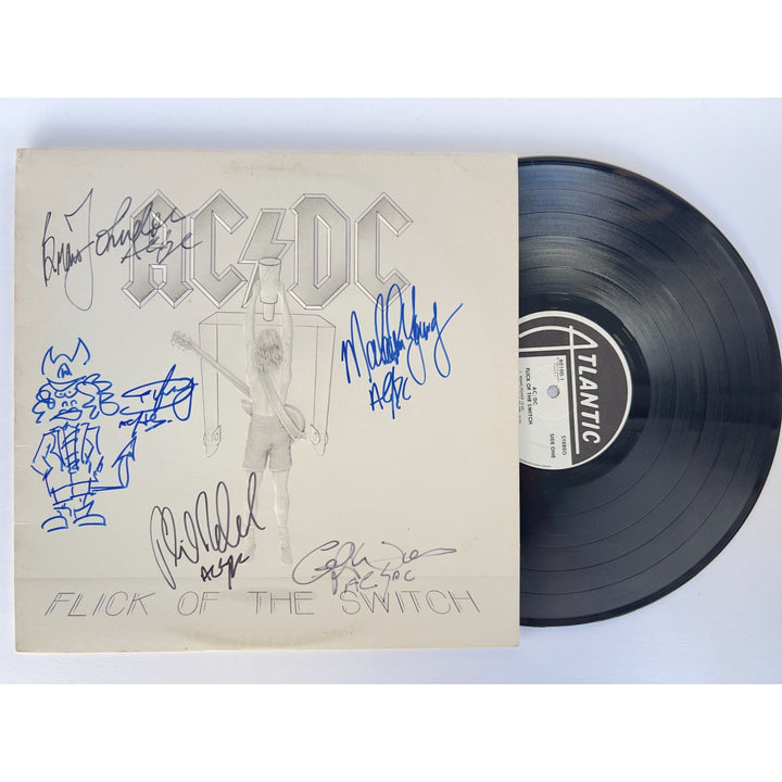 AC/DC " Flick of the Switch" Angus and Malcolm Young, Brian Johnston, Phil Rudd, & Cliff Williams original LP signed with proof