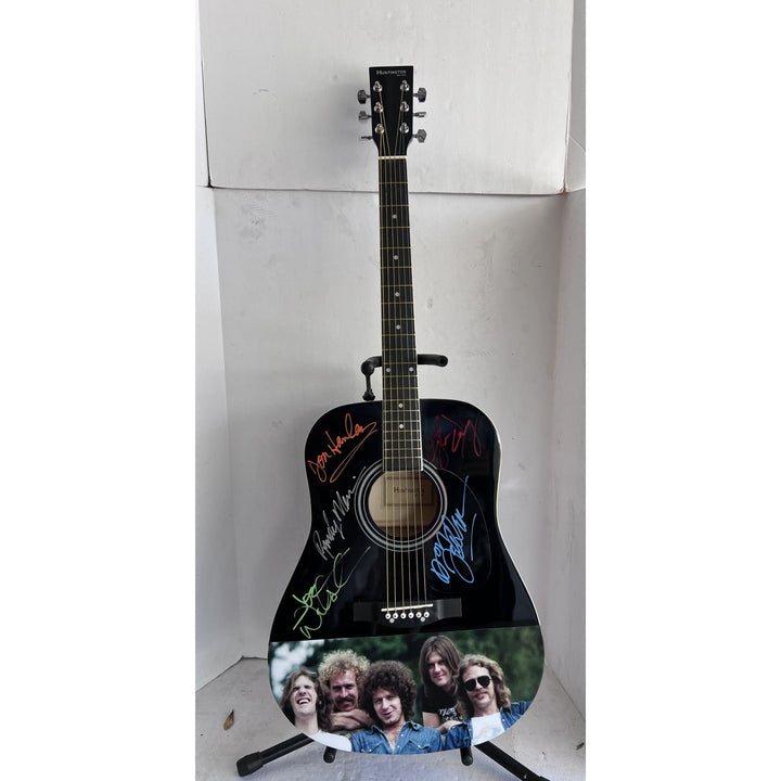 The Eagles Bernie Laden Joe Walsh Don Henley Glenn Frey Randy Meisner signed and inscribed full size acoustic guitar with proof