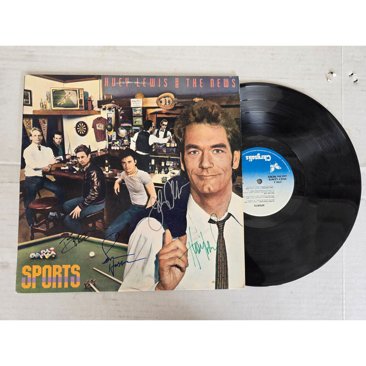 Huey Lewis and the News "Sports" LP signed with proof.