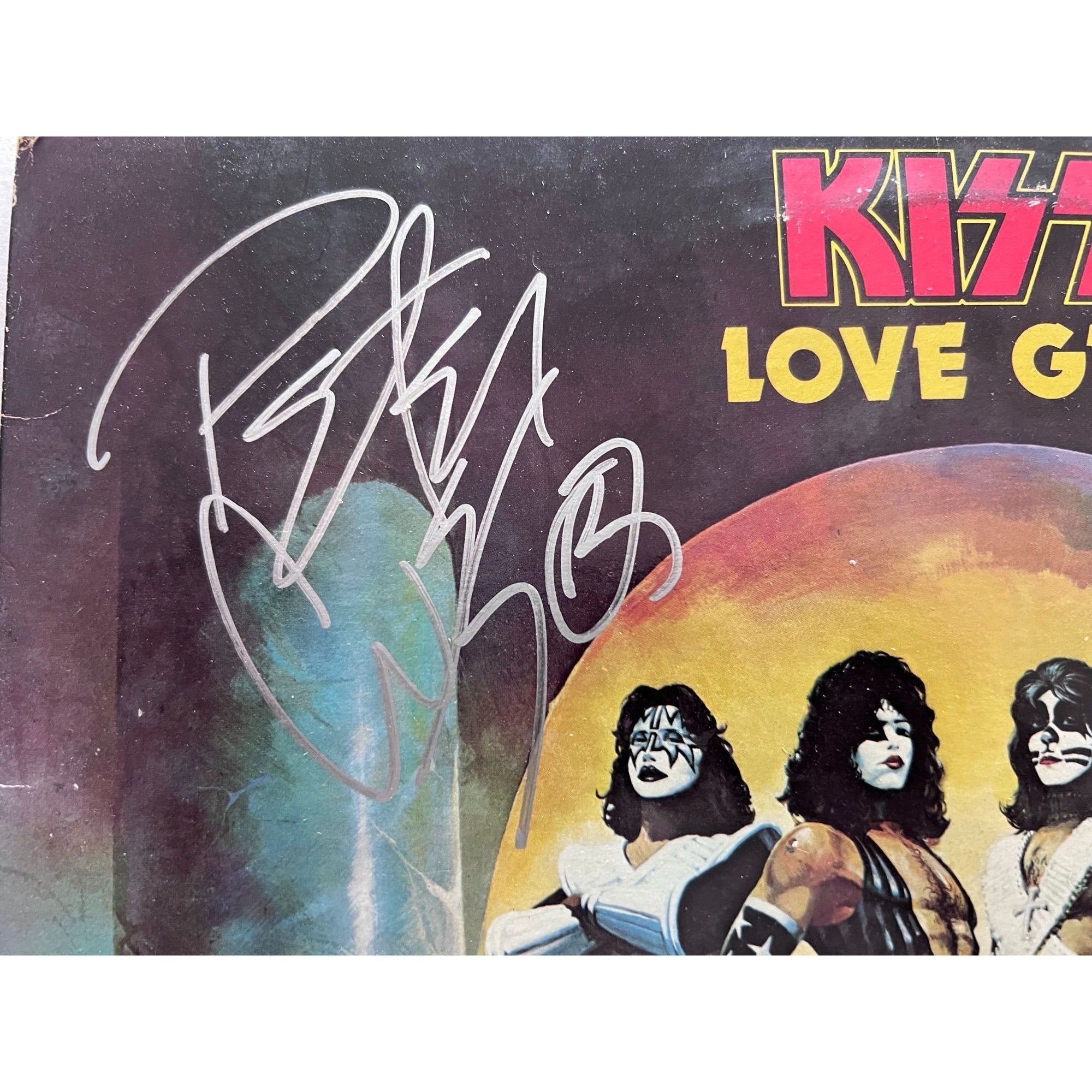 Kiss, Gene Simmons, Paul Stanley, Peter Chris, Ace Frehley Love Gun original lp signed with proof