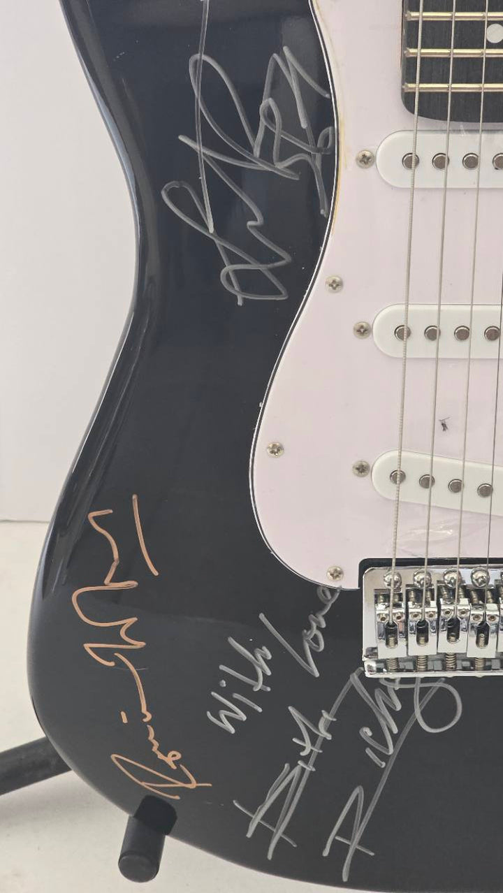 Rolling Stones Mick Jagger, Bill Wyman, Keith Richards, Ronnie Wood and Charlie Watts black Stratocaster full size electric guitar signed with proof and full provenance & CHAT GPT Authentication analysis - AA09260191 - image 3