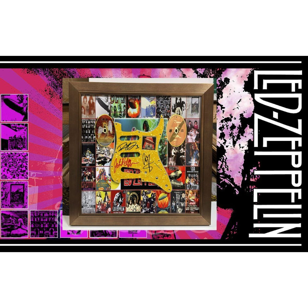 Led Zeppelin Jimmy Page,  John Paul Jones,  Robert Plant Stratocaster electric guitar pickguard signed with proof and museum quality frame