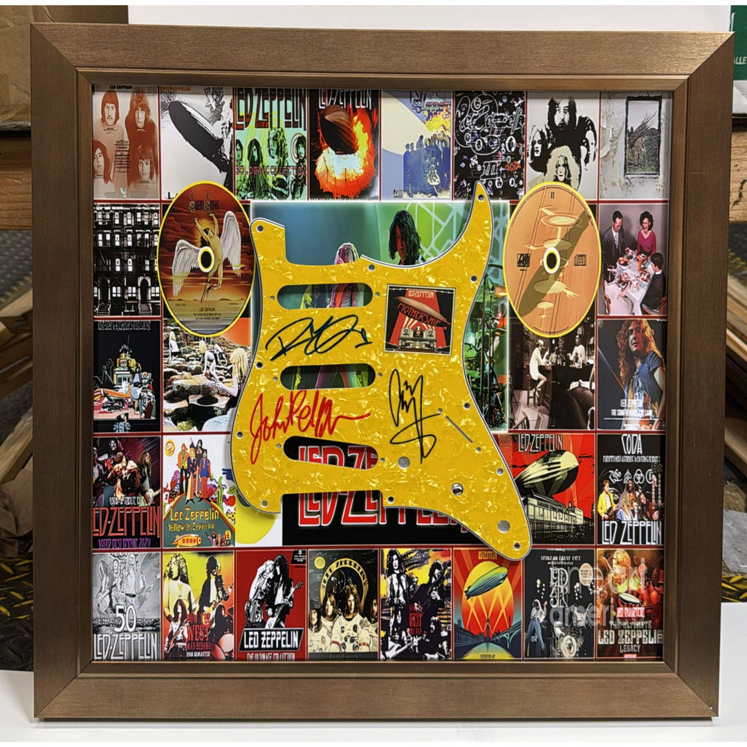 Led Zeppelin Jimmy Page,  John Paul Jones,  Robert Plant Stratocaster electric guitar pickguard signed with proof and museum quality frame