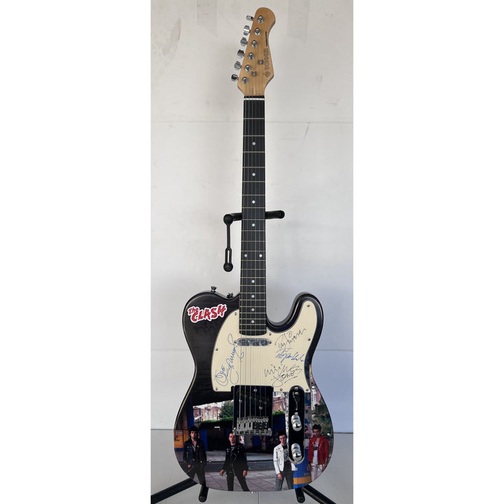 Clash, Joe Strummer, Mick Jones, Paul Simonon, Topper Headon, ONE OF A KIND telecaster, electric guitar, signed, with proof.