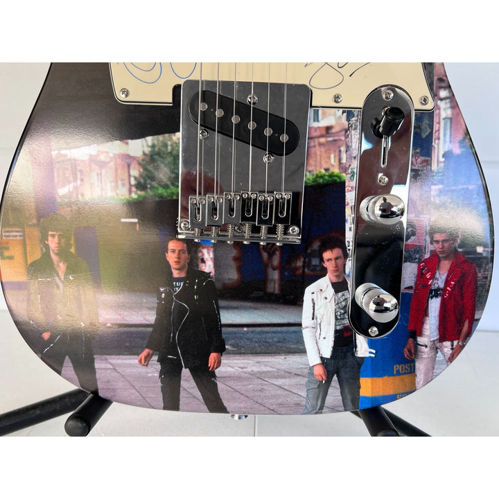 Clash, Joe Strummer, Mick Jones, Paul Simonon, Topper Headon, ONE OF A KIND telecaster, electric guitar, signed, with proof.