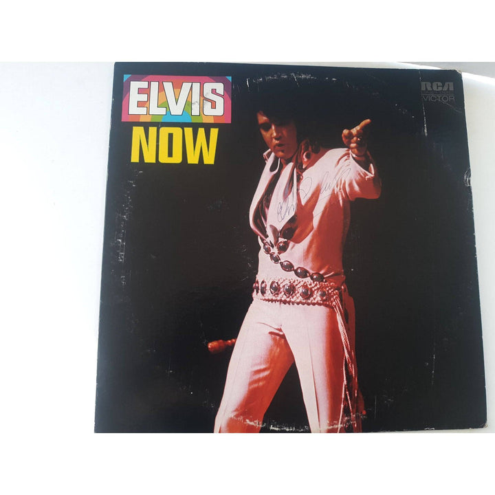 Elvis Presley "Now" LP and vinyl signed with proof