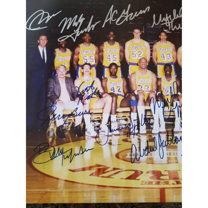 Los Angeles Lakers Earvin Magic Johnson, James Worthy, Jerry Buss team-signed 11 by 14 photo - Awesome Artifacts 