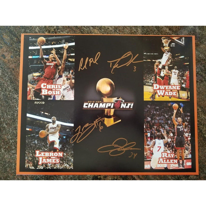 Miami Heat  LeBron James, Dwyane Wade, Chris Bosh and Ray Allen 11 by 14 signed photo - Awesome Artifacts 