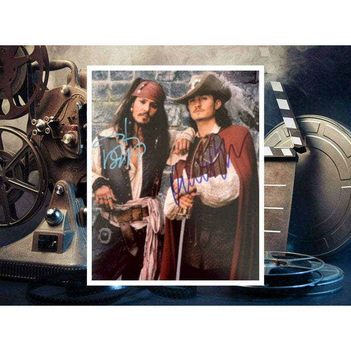 Pirates of the Caribbean Johnny Depp and Orlando Bloom 8 by 10 signed photo with proof